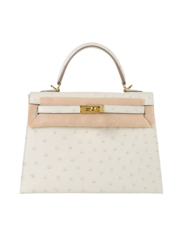Kelly 25 Sellier in Porosus Ostrich - Vanilla Cream with Gold Hardware
