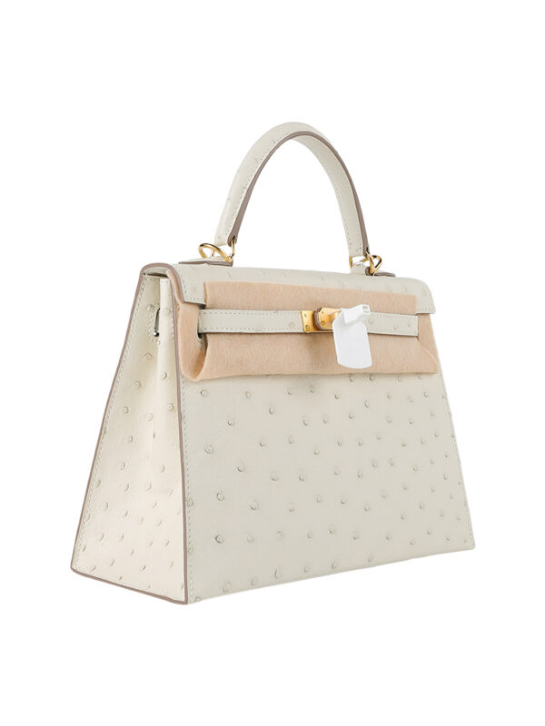 Kelly 25 Sellier in Porosus Ostrich - Vanilla Cream with Gold Hardware